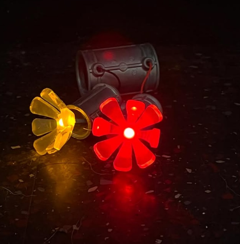 The red and yellow light on a linoleum surface